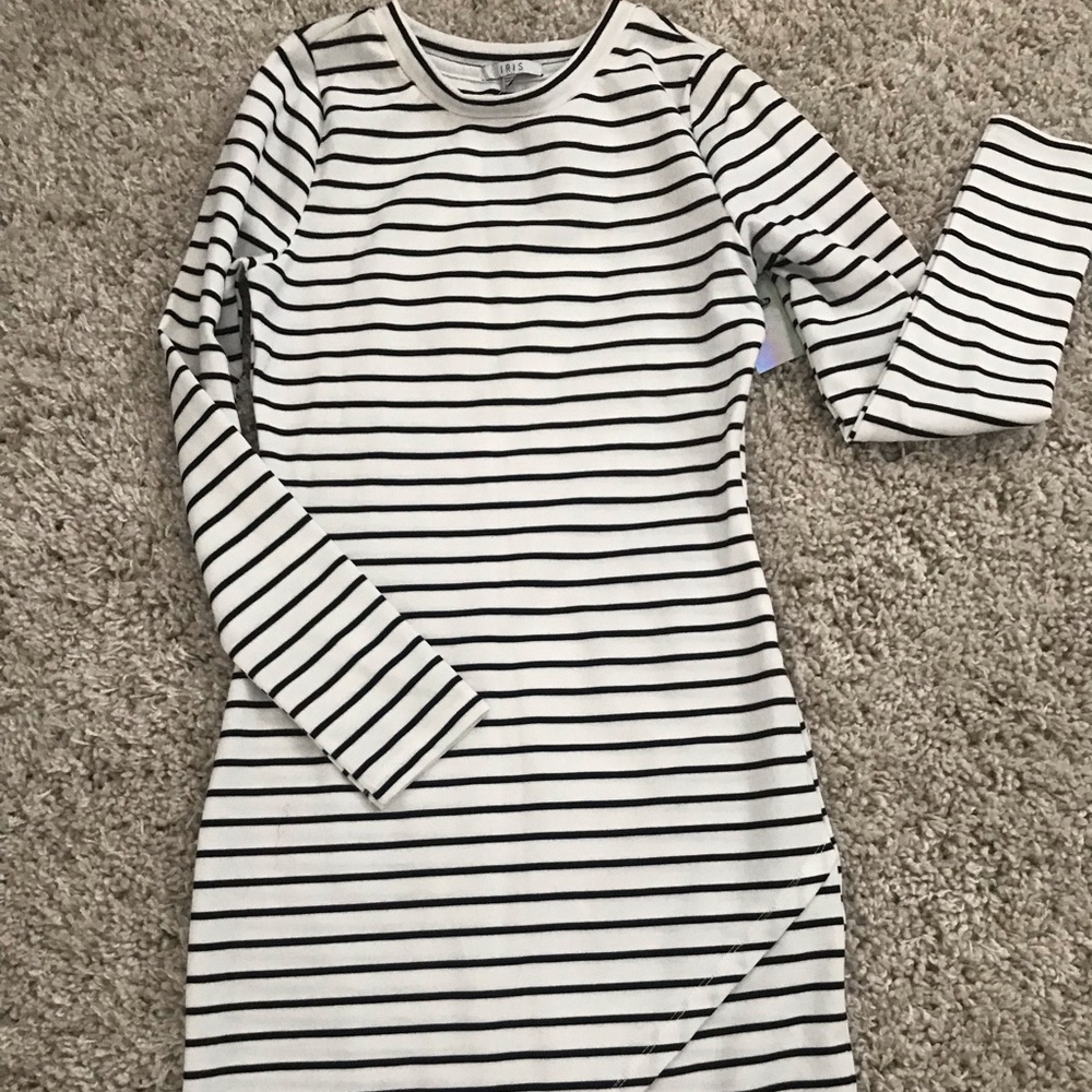 Black and white stripes long sleeve dress.